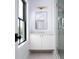 Bathroom featuring modern lighting, floating vanity, and a glass enclosed shower at 2870 Ion Ave, Sullivans Island, SC 29482