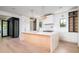 Bright eat-in kitchen featuring a large island, stainless steel appliances, and decorative pendant lighting at 2870 Ion Ave, Sullivans Island, SC 29482