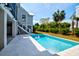 Inviting backyard swimming pool surrounded by lush landscaping and a well-manicured lawn at 2870 Ion Ave, Sullivans Island, SC 29482