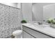 Bright bathroom featuring a shower-tub combo with modern vanity and decor at 292 Shadybrook Dr, Summerville, SC 29486