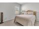 Cozy bedroom with soft lighting, neutral tones, and a comfortable bed at 292 Shadybrook Dr, Summerville, SC 29486