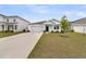 Charming single-story home featuring a well-manicured lawn and attached garage in a residential neighborhood at 292 Shadybrook Dr, Summerville, SC 29486