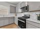 Bright kitchen featuring stainless steel appliances, ample cabinet space, and subway tile backsplash at 292 Shadybrook Dr, Summerville, SC 29486