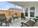 Screened in patio with outdoor furniture and view of the backyard at 292 Shadybrook Dr, Summerville, SC 29486