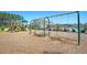 Community playground with swings and climbing structure near pool offering recreational activities for children in a safe environment at 292 Shadybrook Dr, Summerville, SC 29486