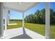 Back patio with beautiful view of green space and lush trees at 302 Chapman Cir, Goose Creek, SC 29445