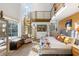Spacious bedroom features a spiral staircase leading to an upper level and large windows at 317 Seewee Cir, Mount Pleasant, SC 29464