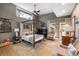Charming bedroom with canopy bed, sitting area, and ample natural light at 317 Seewee Cir, Mount Pleasant, SC 29464