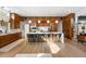 Bright and modern kitchen featuring wood cabinets, a large island, and stainless steel appliances at 317 Seewee Cir, Mount Pleasant, SC 29464