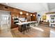 Modern kitchen with wood cabinets, a large quartz island, and stainless steel appliances at 317 Seewee Cir, Mount Pleasant, SC 29464