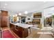 Spacious kitchen with wood cabinets, center island, pendant lighting, and stainless steel appliances at 317 Seewee Cir, Mount Pleasant, SC 29464