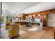 Bright, open kitchen with wood cabinets, a large island, and modern pendant lighting at 317 Seewee Cir, Mount Pleasant, SC 29464