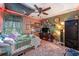 Eclectic bedroom design featuring celestial themes, colorful decor, and carpeted floors at 317 Whispering Breeze Ln, Summerville, SC 29486