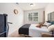 Simple bedroom with a bed, a window, and minimal furnishings, perfect for a guest room or small space at 317 Whispering Breeze Ln, Summerville, SC 29486