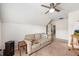 Bedroom featuring a ceiling fan, couch, and a mounted heater at 317 Whispering Breeze Ln, Summerville, SC 29486