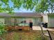 Fenced backyard featuring a patio, gardening boxes, and lush greenery at 325 Dupont Way, Summerville, SC 29485