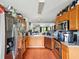 Spacious kitchen featuring stainless steel appliances and wood cabinetry at 325 Dupont Way, Summerville, SC 29485
