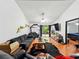Open-concept living room featuring hardwood floors and plenty of natural light at 325 Dupont Way, Summerville, SC 29485