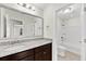 Bathroom with dual sink vanity, granite countertops, large mirror, a toilet and a shower/tub combo at 3321 Tabard Rd, Johns Island, SC 29455