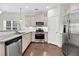 Modern kitchen with stainless steel appliances and light granite countertops at 3321 Tabard Rd, Johns Island, SC 29455
