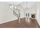 A bright living room with hardwood floors and a cozy fireplace at 3321 Tabard Rd, Johns Island, SC 29455