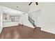 Open concept living room and staircase, with hardwood floors and modern design at 3321 Tabard Rd, Johns Island, SC 29455