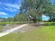 Park with Pond featuring walking path and very large shade tree at 3321 Tabard Rd, Johns Island, SC 29455