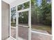 Cozy screened porch with brick floor offering relaxing outdoor views at 3321 Tabard Rd, Johns Island, SC 29455