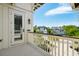Charming balcony with white railings and a view of the neighborhood at 337 Evian Way, Mount Pleasant, SC 29464