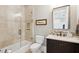 Classic bathroom with tiled shower, dark wood vanity, and neutral color scheme for a tranquil feel at 337 Evian Way, Mount Pleasant, SC 29464