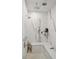 Luxurious shower with marble walls, rainfall shower head, body jets, and built-in seating at 337 Evian Way, Mount Pleasant, SC 29464