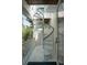 A spiral staircase, an architectural feature, leading to the upper floors at 337 Evian Way, Mount Pleasant, SC 29464