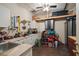 Functional utility room featuring ample counter space, storage cabinets, and a ceiling fan at 337 Evian Way, Mount Pleasant, SC 29464