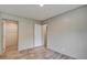 This bedroom features neutral walls, wood-look floors and two access doorways at 409 Peacock Ln, Summerville, SC 29483