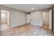 Bright bedroom featuring modern flooring and an attached closet at 409 Peacock Ln, Summerville, SC 29483
