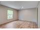 Spacious bedroom with a large window and modern flooring at 409 Peacock Ln, Summerville, SC 29483