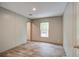 Cozy bedroom with natural light, featuring modern flooring at 409 Peacock Ln, Summerville, SC 29483