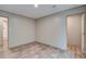Spacious bedroom showcasing an open layout with sleek flooring and neutral wall paint at 409 Peacock Ln, Summerville, SC 29483