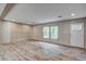 Spacious living room featuring plank flooring, recessed lighting, and built-in wall accents at 409 Peacock Ln, Summerville, SC 29483