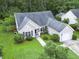 An aerial view of a single Gathering home with a manicured front yard and an attached garage at 5276 Copley Cir, Summerville, SC 29485