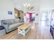 Comfortable living room featuring a view into the dining room at 5276 Copley Cir, Summerville, SC 29485