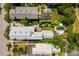 This aerial view shows the layout of the yards and swimming pool, and how they are situated on the property at 6 Judith St, Charleston, SC 29403