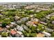 Aerial view shows neighborhood with mature trees and the variety of homes, buildings and architecture in the area at 6 Judith St, Charleston, SC 29403