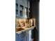 Stylish bar area with custom cabinetry, marble countertops, and a chic sink at 6 Judith St, Charleston, SC 29403