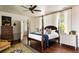 Spacious bedroom featuring a four-poster bed, hardwood floors, and bright natural light at 6 Judith St, Charleston, SC 29403
