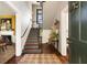 Inviting foyer with hardwood floors, staircase, and decorative accents at 6 Judith St, Charleston, SC 29403