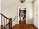 Hallway featuring hardwood floors, leading into a room with stylish furniture, showcasing the home's inviting interior at 6 Judith St, Charleston, SC 29403