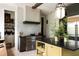 Kitchen features a tile backsplash, stainless steel range, pot filler and a center island at 6 Judith St, Charleston, SC 29403