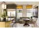 Open concept kitchen with stainless steel refrigerator, breakfast nook, and large center island at 6 Judith St, Charleston, SC 29403