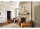 Living room with fireplace, hardwood floors, and stylish furnishings, highlighting a comfortable and inviting atmosphere at 6 Judith St, Charleston, SC 29403